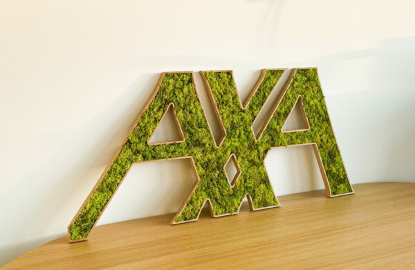 Logo végétal AXA réalisé par Ateliers de Chevreuse.